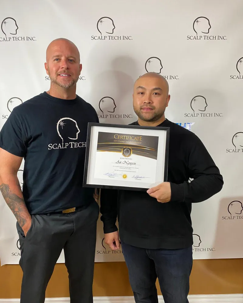 Scalp Tech Inc. training graduate with Ken