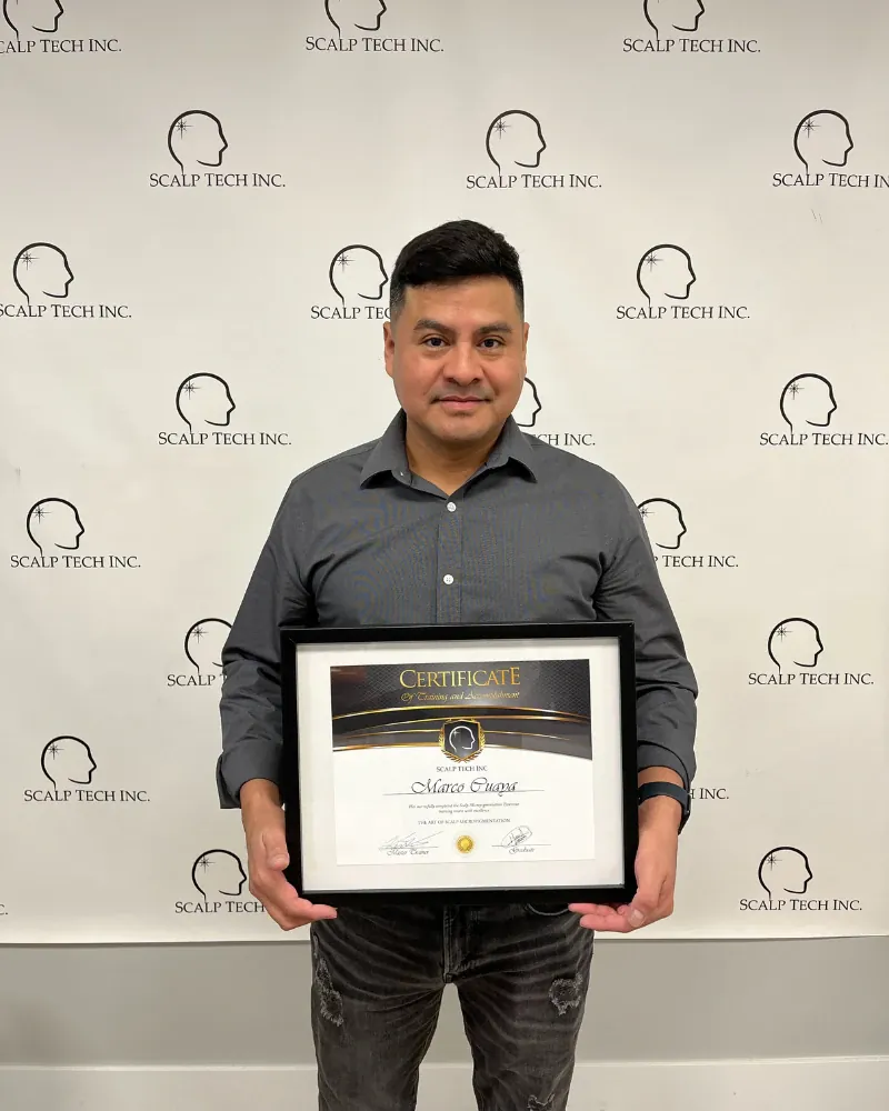 Scalp Tech Inc. training graduate with certificate